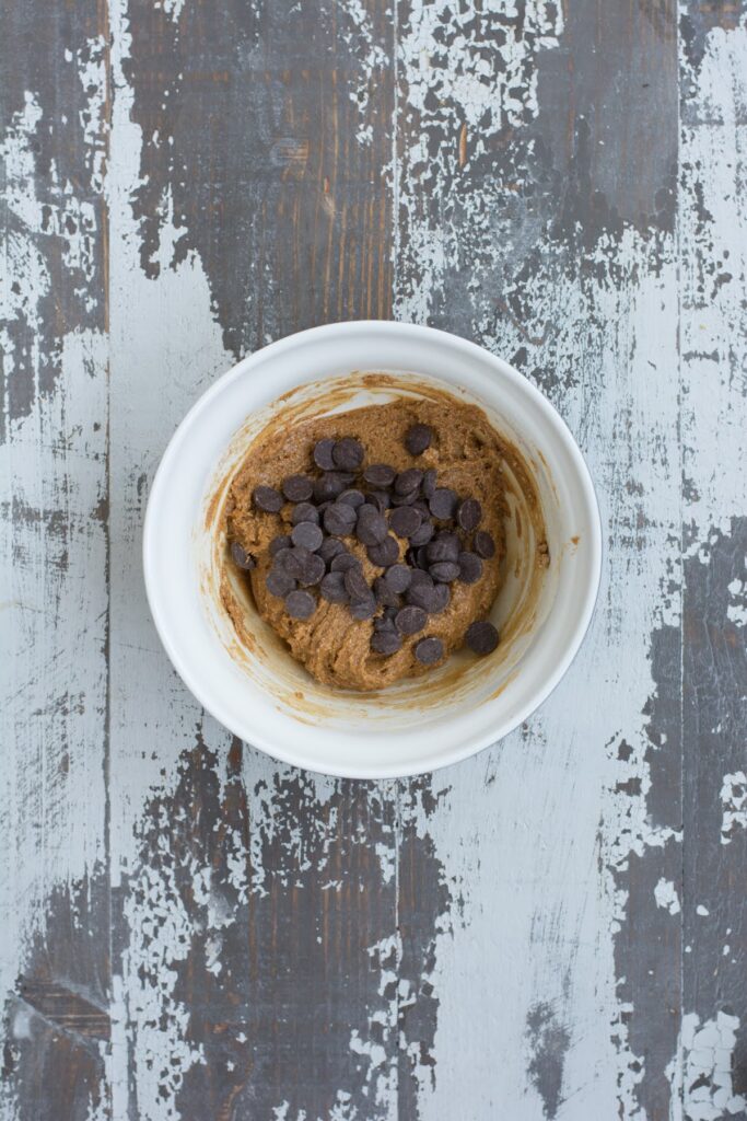 These healthy Peanut Butter Chocolate Protein Cookies are a wholesome, easy-to-make treat that the whole family will love. Adding chocolate chips to cookie dough.