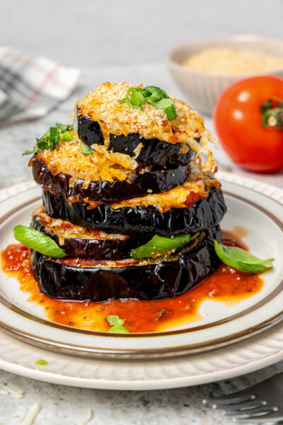 Cheesy air fryer eggplant parmesan on a plate.