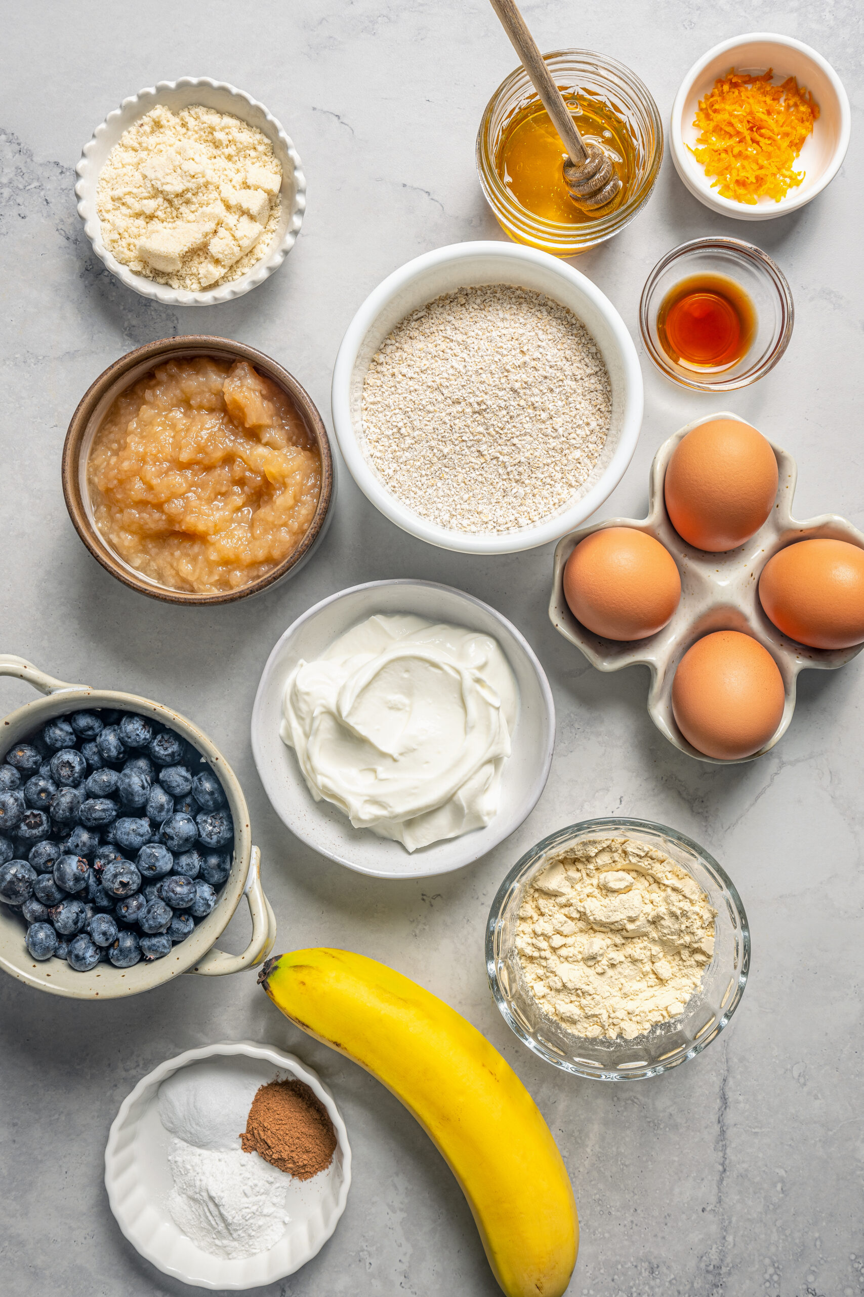 This naturally-sweetened blueberry protein muffins recipe with cinnamon and orange zest is a great on-the-go breakfast. Ingredients for blueberry protein muffins.