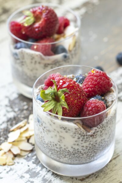 Chia Seed Pudding with berries served in a cup