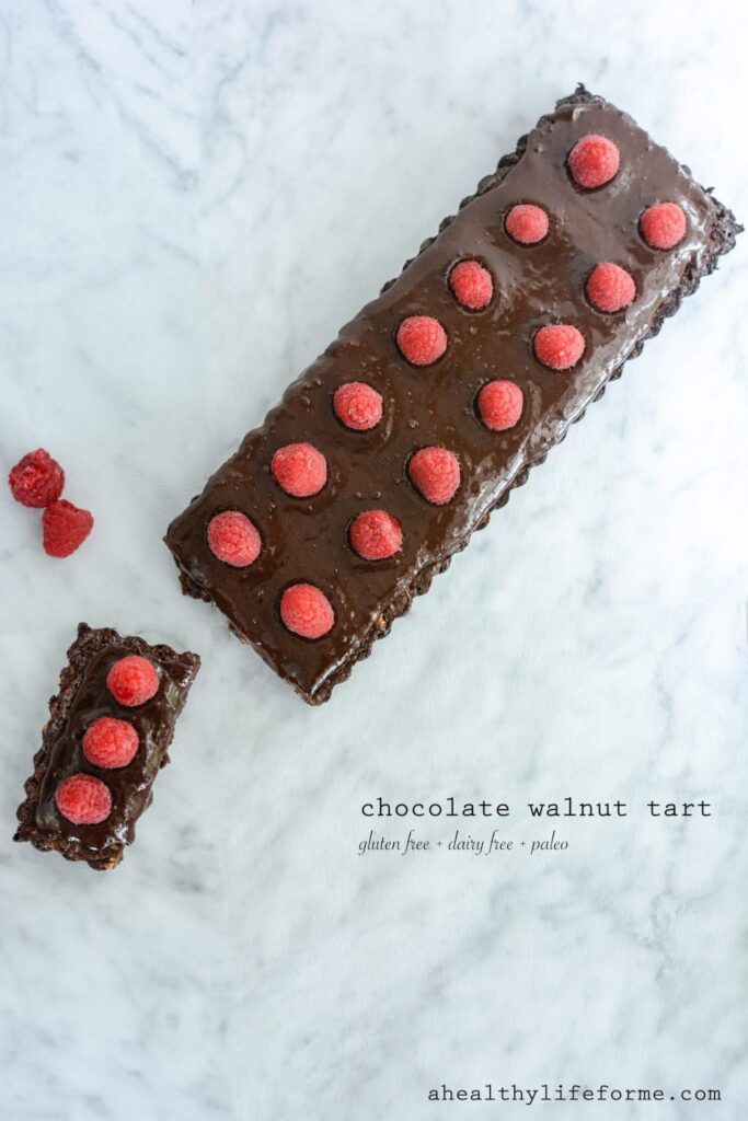 Chocolate Walnut Tart with Raspberries is a triple dose of chocolate that makes this one incredible dessert. I kept the recipe clean, so this tart is gluten free, dairy free and paleo friendly.