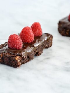 Chocolate Walnut Tart with Raspberries is a triple dose of chocolate that makes this one incredible dessert. I kept the recipe clean, so this tart is gluten free, dairy free and paleo friendly.