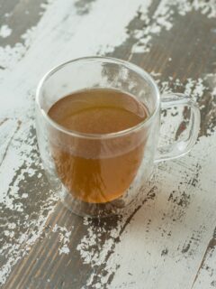 chicken bone broth in a glass mug