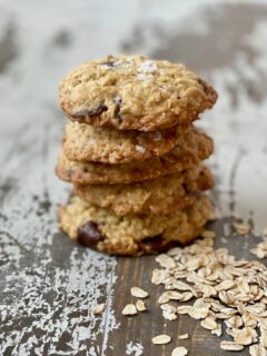 Gluten free oatmeal chocolate chip sea salt cookies in a stack.
