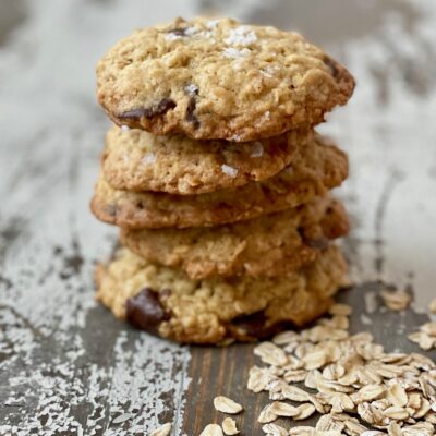 Gluten free oatmeal chocolate chip sea salt cookies in a stack.
