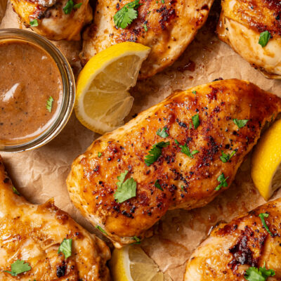 Landscape photo of grilled chicken with Asian BBQ sauce.