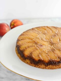 Peach upside down cake with a caramelized peach topping.