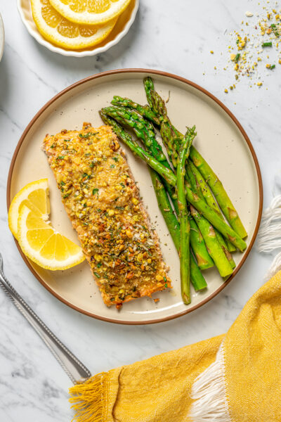 A plate of salmon and roasted asparagus.
