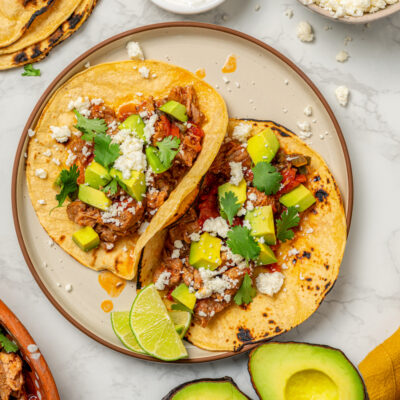 Landscape photo of pulled pork tacos.