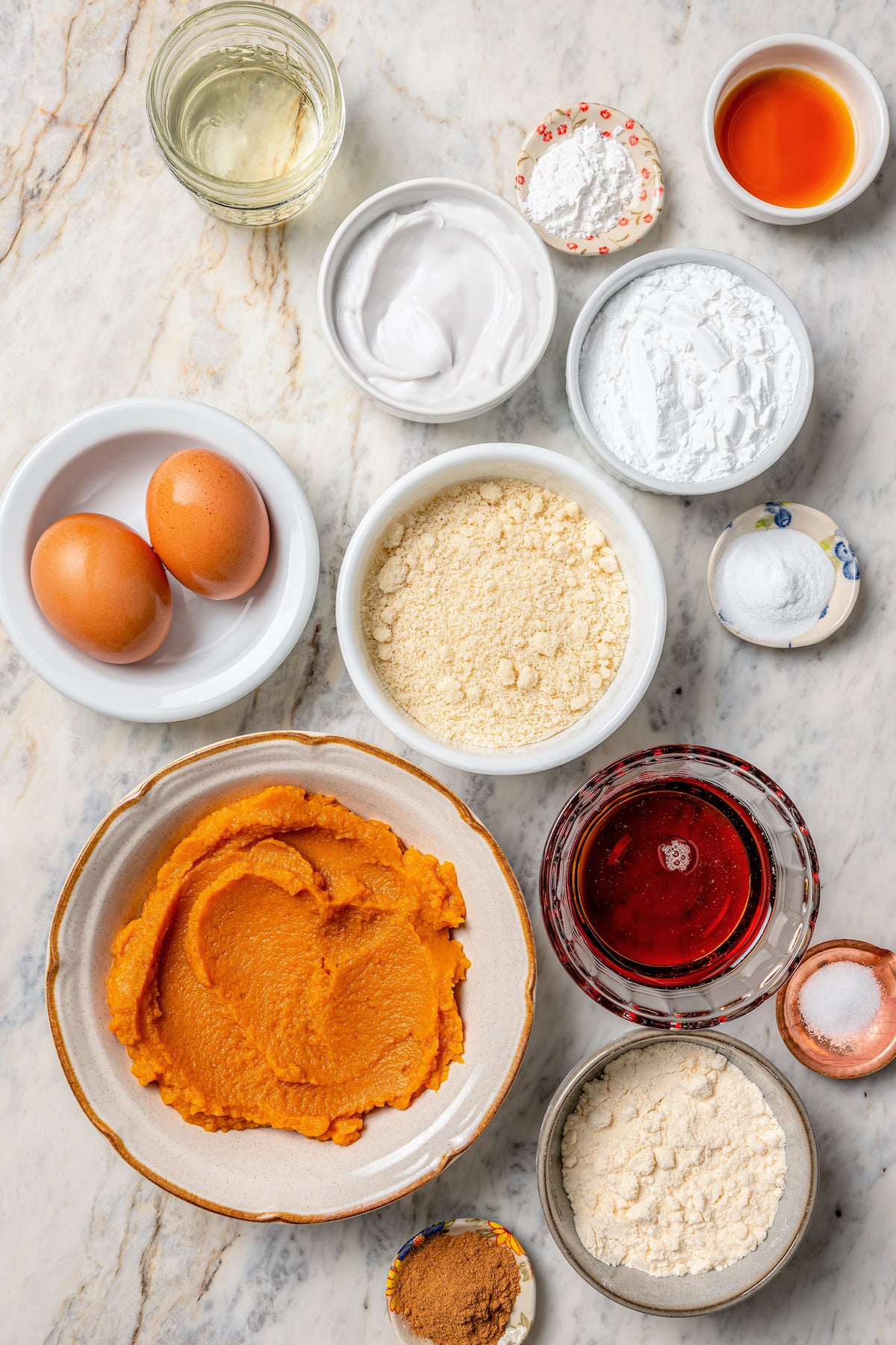 This tender paleo pumpkin bread recipe with vegan flours, coconut cream, and maple syrup is an easy fall-flavored dessert. Ingredients for making paleo pumpkin bread.