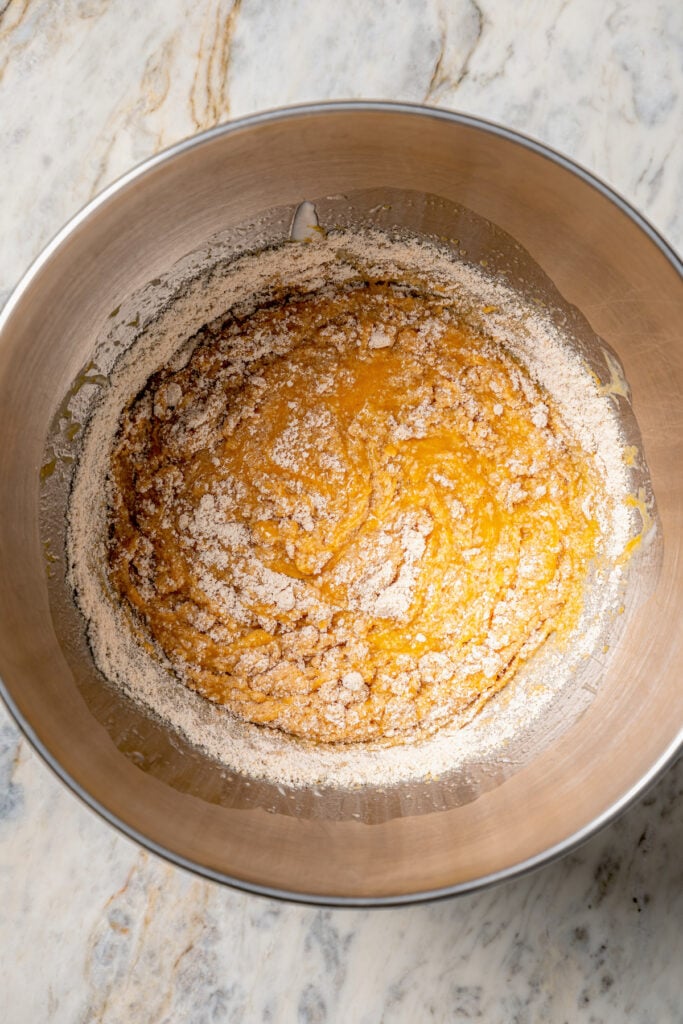This tender paleo pumpkin bread recipe with vegan flours, coconut cream, and maple syrup is an easy fall-flavored dessert. Combining the wet and dry mixtures.
