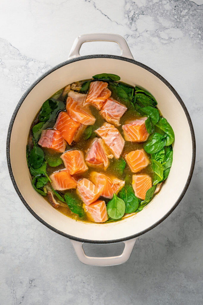 This Easy Salmon Soup is made with fresh salmon, fennel, leeks, and shitake mushrooms. It's unbelievably good, and good for your your body! Salmon and spinach added to soup.